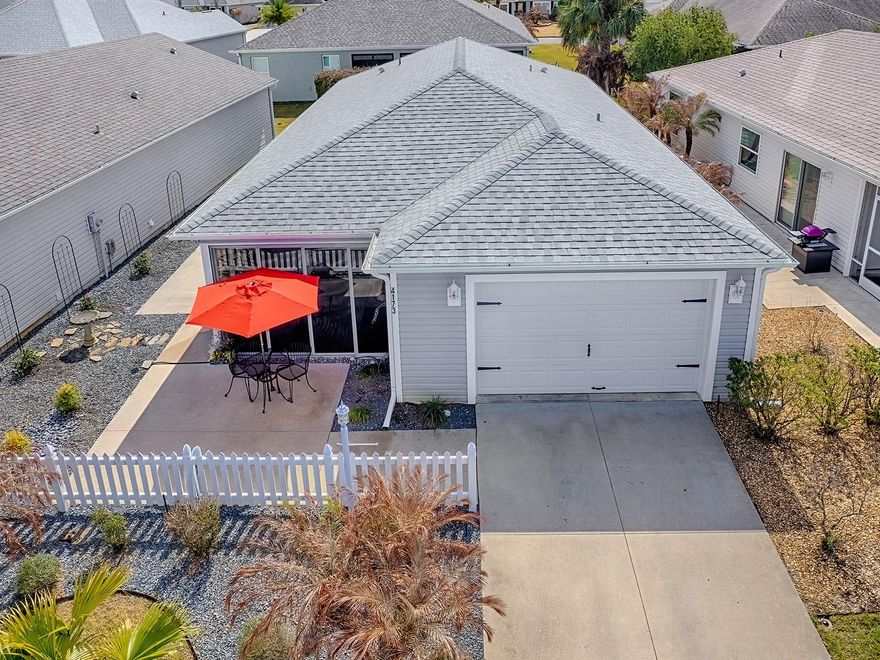 Ever hear the phrase “Priced to Sell”? Well…this one is TRULY PRICED TO SELL! This "TURNKEY" 2/2 COLONY Patio Villa was gently and seasonally used by the original owners and is ready for a QUICK CLOSE! Located in the highly sought-after Village of OSCEOLA HILLS, this beautifully maintained home offers upgrades you’ll truly appreciate from the moment you walk in. The Primary Shower has been thoughtfully retrofitted and customized for WHEELCHAIR ACCESSIBILITY, complete with SAFETY GRAB BARS and a convenient FOLD-UP MOUNTED SEAT — a rare and valuable feature! This LIGHT & BRIGHT home features LUXURY VINYL PLANK FLOORING throughout (NO CARPET!), Knockdown Ceilings, Granite-look Laminate Countertops, STAINLESS APPLIANCES, and an Indoor Laundry — just to name a few of the special touches. Enjoy your NE-Facing Acrylic ENCLOSED LANAI — the perfect spot for morning coffee — plus a lovely side patio ideal for grilling or simply relaxing outdoors. The OPEN FLOORPLAN enhances the spacious feel with an Eat-In Kitchen offering abundant counter space, plenty of cabinetry with Pull-Out Shelves, and a Large Breakfast Bar that creates a cozy gathering space. The Living and Dining areas provide excellent flow and flexibility for furniture placement. Whether you’re looking for SEASONAL USE or a smart INVESTMENT opportunity, this home checks the boxes! The Primary Suite offers a spacious Walk-In Closet and En-Suite Bath (wheelchair accessible), while the Guest Bedroom and separate Guest Bath with Tub/Shower combo are perfect for visiting family and friends.  The Inside Laundry (with a NEW LG Dryer) features double doors and ample storage space. Additional extras include window blinds and treatments, newer garbage disposal, gutters, recently repainted interior, and a current Termite Plan in place with Massey. Only 10 years young and lovingly cared for — nothing to do but move right in! 2007 Gas Club Car Precedent Golf Cart may be negotiated separately. Tax line reflects property taxes only ($3,587.63). CDD line reflects the combined annual bond, maintenance, and fire district ($1,392.60). Bond Balance: $7,968.02.  So, what are you waiting for? If not now, when?