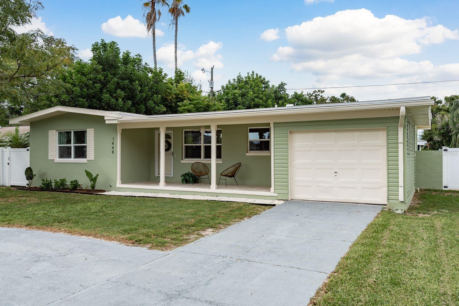 WELCOME HOME! to this beautifully renovated 3-bedroom, 2-bath single-family residence with a 1-car garage in the heart of Clearwater. Step inside and you’ll immediately appreciate the open design, which creates a light, spacious feel that’s perfect for both everyday living and entertaining. The brand-new kitchen features quartz counters, a large, sit-around center island, and stainless steel appliances, seamlessly connecting to the dining and living areas. Luxury vinyl plank flooring runs throughout the home, while both bathrooms have been fully remodeled with stone floors and modern fixures and tile. Outside, new white vinyl fencing provides privacy for a safe and secure backyard.
Located in the desirable “Fruitbowl” neighborhood, once part of historic Sunny Park Groves, this home is surrounded by established, well-maintained properties. Centrally located, it’s just minutes from shopping, top-rated schools, and only a short drive to Clearwater’s famous beaches. Enjoy the peace of mind that comes with living in High & Dry ZONE X with no HOA restrictions. Whether you’re a first-time buyer or looking for the perfect home for your family, this is a TURNKEY, move-in ready property that offers comfort, convenience, and the best of Florida living.