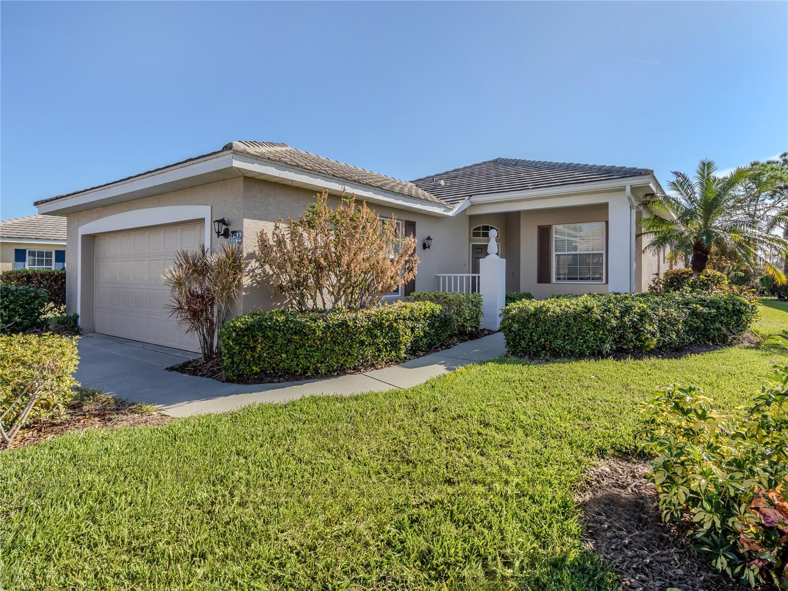 One or more photo(s) has been virtually staged. 3BR/2.5BA Stand-alone Villa in in the highly desirable St. Andrews East at Plantation Golf & CC!
Beautifully maintained with a spacious layout, this home features two ensuite bedrooms and a versatile flex space that could be your office or work out room. The large eat-in KITCHEN features a bay window and has plenty of cabinets and counter space for the chef in the family. Tile floors flow throughout the open living area. MAINTENANCE FREE living includes roof, exterior, and structure insurance—NO CDD fees! Optional membership offers golf, tennis, pickleball, fitness & clubhouse dining. Minutes to Wellen Park, Braves Stadium, Venice & beaches. You will love this home, call today to check it out!