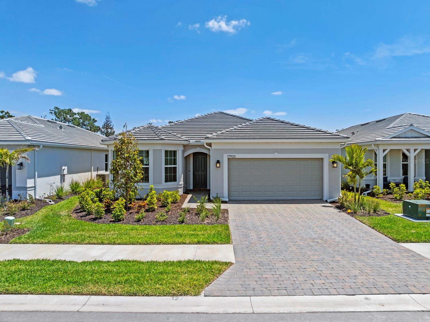 New construction, available now! Discover Legacy Groves by Pulte! This Mystique has tile flooring throughout, stainless steel appliances, water views & features a zero-corner sliding glass door leading to the extended covered lanai, an enclosed flex room, tray ceiling in the gathering room, hurricane impact windows, an three car tandem garage & so much more! Beyond the exceptional features of the home, the community guarantees peace of mind with its secure gated entrance, quality construction, and the convenience of maintenance-free living. Located just 4 short miles to Historic Downtown Venice and Venice Beach for prime shopping, dining, local markets, year-round sunsets, and outdoor activities. Enjoy walking, running, and biking along Florida's Legacy Trial, less than 1 mile away. Don't miss the opportunity to claim this gem as your own. Book a viewing today and experience upscale living at its finest!