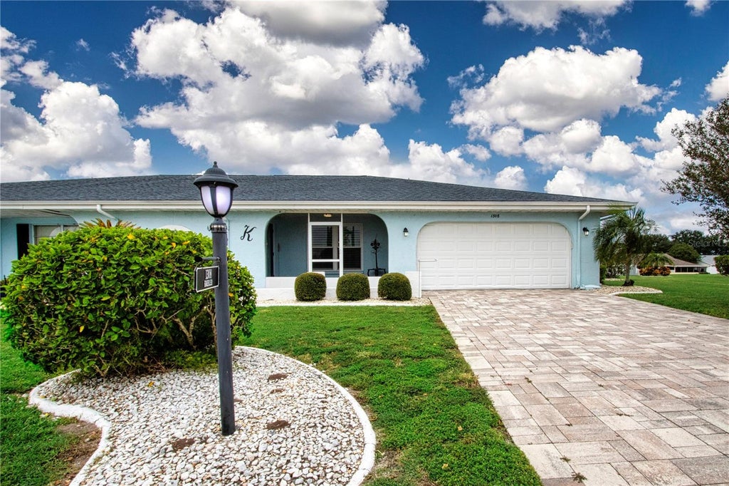 Photo of 1308 Bluewater Drive, Sun City Center, FL 33573 (MLS # TB8550437)