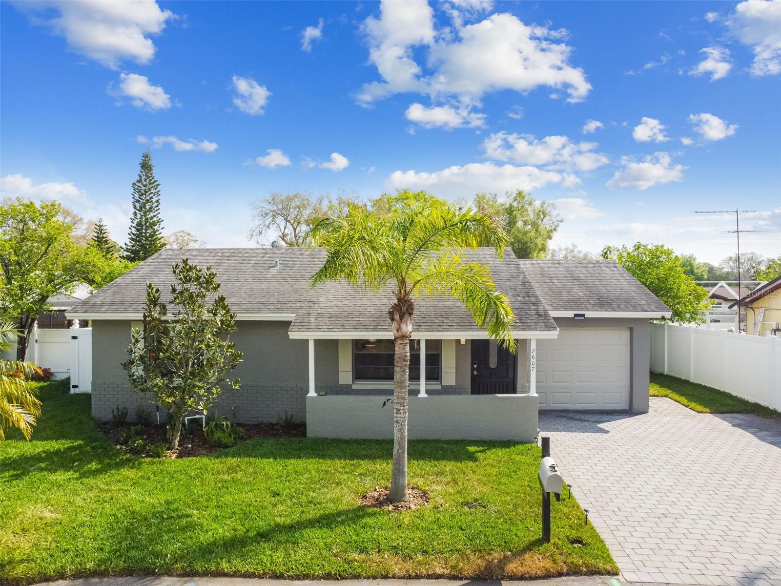 7607 WOODLAND OAKS COURT