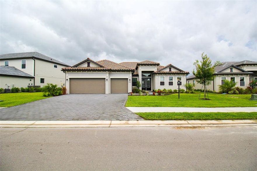 Welcome to Grand Getaway! This lakefront 3-bedroom, 3-bath, newly built private pool home has everything you need to make your vacation spectacular. This home is located in Lorraine Lakes, a newly developed gated community within Lakewood Ranch, Florida. Your adventures and boundless. Location is everything; this home is only a short distance from everyday conveniences such as shopping, restaurants, recreation centers, and the crystal-clear beaches Florida offers. Check out the surrounding resort-style Golf Courses! There are several in Lakewood Ranch; the most desirable to golfers is Esplanade, 4 minutes from the house, and River Strand, 14 minutes from the house! This estate home has a large paved driveway and pathway to the front door. Upon entering the house, you will find an open concept floor plan. The spacious living room has three plush couches for you to kick back and relax after a day by the pool, along with a Smart TV. You will find chic décor throughout this entire home. Adjacent is the office, where you can set up your remote office and have the perfect workcation. There is also a futon in the office. The chef’s kitchen has it all, fully stocked with a giant island with four barstools and all stainless-steel appliances. Adjacent is the dining room. This stunning table has views of the lake and can accommodate up to six comfortably. The primary bedroom is located off of the living room. This spacious room has a king-size bed, a Smart TV, and a set of sliding glass doors to the backyard with plenty of space for you to unwind after a day of adventure. The primary bathroom has a large walk-in closet, dual vanities, and an enormous walk-in shower with a detachable showerhead. The second bedroom has two twin-size beds with plenty of closet space for your personal belongings. The second bathroom has an updated vanity with a shower/tub combo. Down the hall is the third bedroom with a queen-size bed and a walk-in closet. Attached is the third bathroom with an updated vanity and a walk-in shower. The outdoor awaits! This stunning home has unobstructed views of the gorgeous lake. There is ample outdoor seating, a couch and chairs, a high-top table, Adirondack chairs, and plenty of chaise lounges. Enjoy the day swimming in the large rectangular pool, take a dip in the spa at night, and enjoy the pure tranquility this home offers. House Rule: No smoking. No burning candles inside of lodging. No parties. No Pets. Pool heating is optional, for an additional non-refundable fee of $25 per day + taxes to be paid directly to the management company after the reservation is confirmed. The Clubhouse and Amenities are being built and will be ready in early December 2022. There will be a Clubhouse with a state-of-the-art fitness center, aerobics studio, splash park, a large resort style community pool, a playground, a sports court, basketball court, tennis courts, volleyball courts and much more.

**Taxes and fees not included.