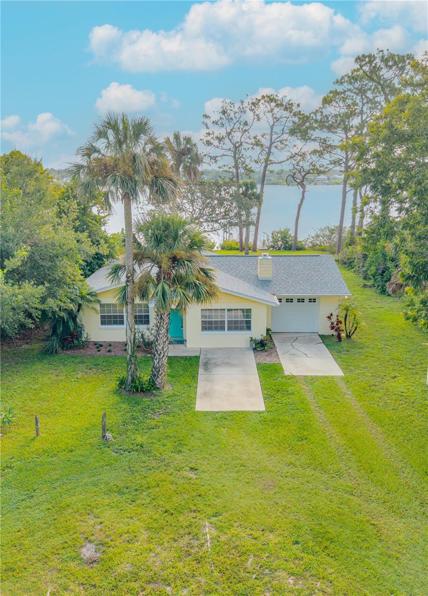 Beautifully updated 3 bed, 2 bath waterfront home with Intracoastal access on a quiet, safe street, just minutes to Flagler Avenue, Canal Street, and the beaches. Enjoy coffee on your back patio with panoramic water views while watching dolphins, manatees, sea turtles, and coastal birds. Fish from the covered dock or launch your boat, kayak, or paddleboard from the private ramp and boat to the disappearing island.
This sun filled home features an open floor plan with serene waterfront views, a recently remodeled chef’s kitchen with Omega cabinetry by Kitchen Gallery, Carrara marble countertops, stainless steel appliances, and a breakfast island. Additional highlights include a formal dining area, central vacuum system, and outdoor storage shed.
Located in a wonderful neighborhood near golf courses, trap and skeet shooting, and top tier biking and walking trails at Doris Leeper Preserve. Peaceful yet close to everything, your waterfront paradise!