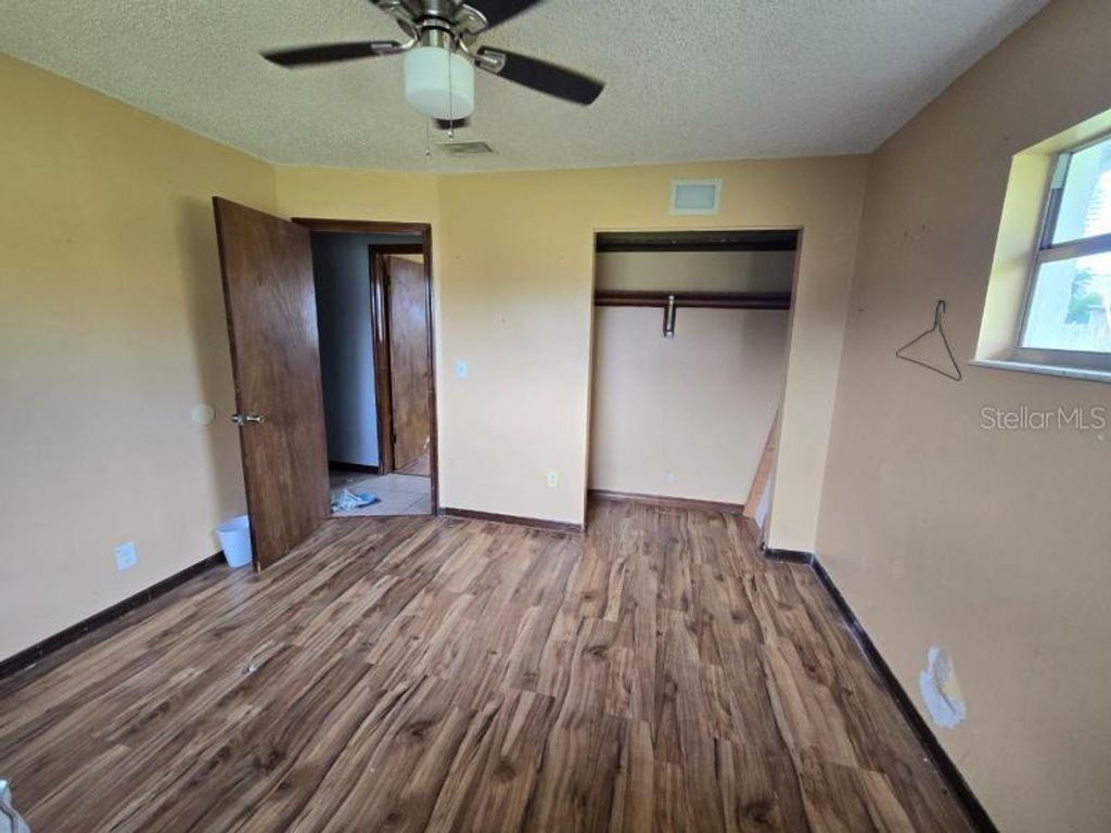 Photo of 399 NE Pepper Street, Palm Bay, FL 32907 (MLS # TB8473414)