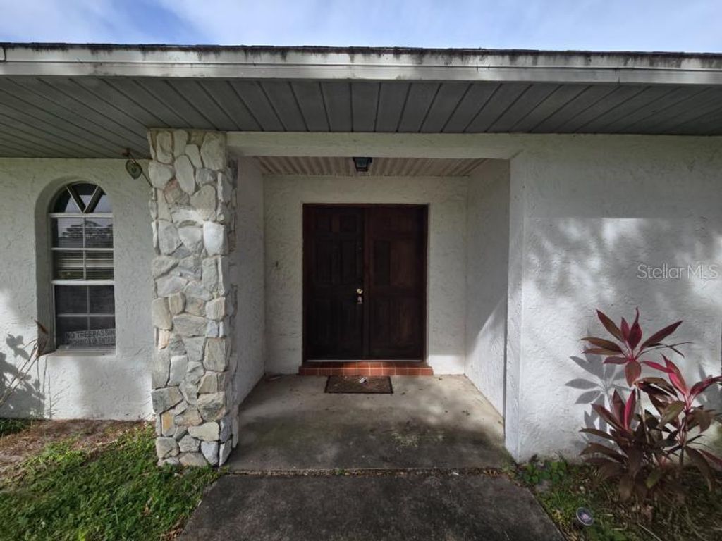 Photo of 399 NE Pepper Street, Palm Bay, FL 32907 (MLS # TB8473414)