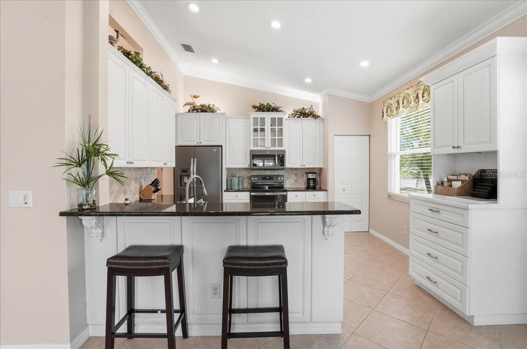 Photo of 4246 65th Place E, Sarasota, FL 34243 (MLS # A4685293)