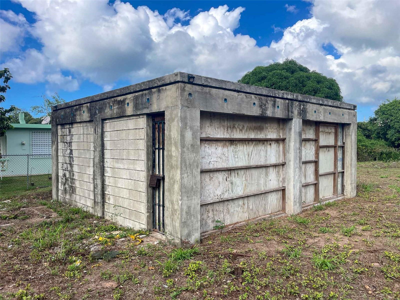 Discover your dream of Caribbean life with this unique parcel of land for sale in the tranquil Monte Santo Playa neighborhood of Vieques, Puerto Rico. With 1.25 acres of prime Vieques land, this property presents an unparalleled opportunity to invest in Vieques real estate, a gateway to a lifestyle embraced by the beauty and serenity of the Caribbean.
Imagine owning a piece of Vieques Island real estate that not only offers the potential for personal retreat but also an investment in the growing demand for long-term rentals on the island. This parcel includes a 528 square foot garage with two stalls, a 150 square foot casita shell, and an old foundation of 252 square feet, laying the groundwork for your vision to come to life.
Positioned close to the white sands of Monte Santo Playa, you're never far from a leisurely day at the beach or an enchanting evening stroll along the shore. Moreover, with proximity to supermarkets, schools and restaurants, the conveniences of daily life are readily accessible, allowing you to indulge in the Caribbean lifestyle with ease.
Vieques, Puerto Rico real estate is not just about the structures and land; it's about the experience. Vieques Island is a treasure trove of natural wonders, from the wild horses roaming freely, adding a touch of magic to the landscape, to the world-famous Bioluminescent Bay, where the waters glow with a natural luminescence that has to be seen to be believed. Here, every moment is a postcard of peace and tranquility, offering an escape from the hustle and bustle of the mainland.
The property's location is ideally situated between the Vieques airport, Isabel Segunda, and Esperanza, providing easy access to all of the island's key destinations. The neighborhood, predominantly comprised of single-family homes, exudes a welcoming atmosphere, with the street leading directly to the beach, ensuring privacy and tranquility as no through traffic disturbs the peace.
For those considering land for sale in Puerto Rico, especially in Vieques, this parcel not only promises a slice of the coveted Caribbean lifestyle but also a strategic investment opportunity. The flat terrain is perfect for developing a small apartment or condo complex, catering to the island's need for long-term rental options and offering a potential return on investment.
As your trusted realtor specializing in Caribbean and Puerto Rico real estate, we invite you to explore the potential of this Vieques Island real estate for sale. Whether you're drawn to Vieques for its gorgeous beaches, exquisite dining, the tranquility that permeates every corner, or the allure of the Vieques Fish & Wildlife Refuge, this property is your canvas to create a personal paradise or a profitable venture in the heart of the Caribbean.
Don't miss the chance to be part of the vibrant Caribbean lifestyle, where the allure of Vieques properties beckons. Let's embark on this journey together, transforming your dreams of island living into reality. Contact us today to discover more about this exceptional land for sale in Vieques, Puerto Rico – your gateway to a life less ordinary.
Please note that other than the garage, this is a major fixer-upper property. It is best to focus on building something new on this parcel, rather than using the existing casita and foundation.