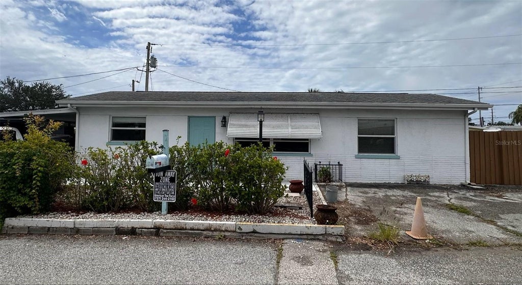 Photo of 923 E 122nd Avenue, Tampa, FL 33612 (MLS # TB8546613)