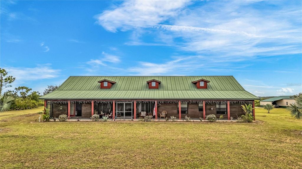 Photo of 30720 Washington Loop Road, Punta Gorda, FL 33982 (MLS # C7514749)