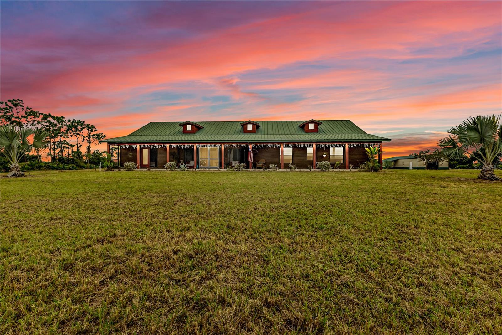 Discover the perfect blend of country living and modern amenities with this spacious 2 Winged 4-bedroom, 3-bathroom home set on over 5 sprawling acres of AG Zoned land in Punta Gorda. This horse-friendly property is a dream for equestrian enthusiasts, featuring a brand-new barn with carport that has plenty of room for your vehicles, RV, Boat, equipment, or recreational storage. A newer well and water filtration system provides added convenience, ensuring reliable water access
The expansive property offers ample room to create your own outdoor oasis, with plenty of space for horses, gardens, or simply enjoying the peace and quiet of rural life. Situated in a serene area, you'll enjoy easy access to the natural beauty of nearby parks and trails, while still being a short roughly 15 minute drive into Punta Gorda's vibrant downtown with its charming shops, award winning small town food scene, waterfront dining, live music, and year-round festivals and events.
Whether you're looking to embrace a country lifestyle or need room to spread out and enjoy the outdoors with a cup of coffee at daybreak by your pond, ice cold drink by your sparkling pool in the afternoon, snuggled up with a hot cocoa next to your fantastic fire pit gazing up at the stars by night, this amazing ranch is the home for you.
It's time to stop dreaming and start LIVING your Sunshine Day SWFL lifestyle today.