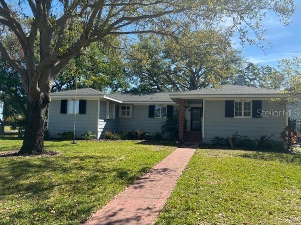 Photo of 559 Chicago Avenue, Dunedin, FL 34698 (MLS # TB8502580)
