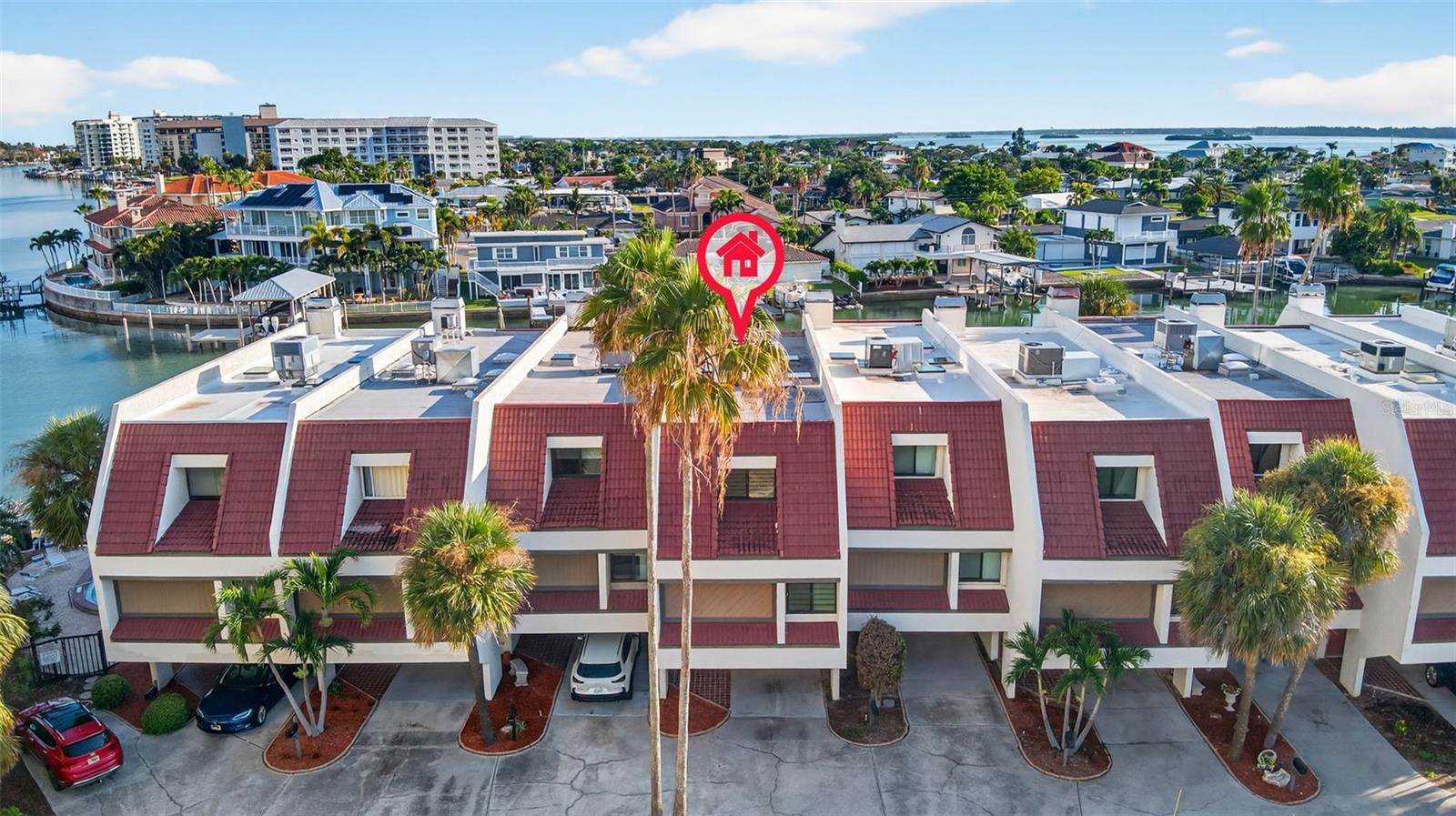 Welcome to this beautifully maintained and move-in-ready 3-bedroom, 3-bathroom townhouse that offers the best of Florida living. Imagine having your own boat docked right in your backyard—complete with a 2022 10,000 lb. boat lift, plus water and electric hookups for ultimate convenience.
Inside, you'll find elegant hardwood floors throughout and fresh interior paint that adds a bright, inviting feel. The home boasts a new 2023 HVAC system and updated vent covers, ensuring year-round comfort.
This home offers peace of mind and modern luxury, featuring all high-impact-rated windows, sliders, front door, and side window. Enjoy the convenience of motorized blinds and sleek recessed lighting throughout.
The kitchen is a chef’s dream, featuring high-end appliances, sleek quartz countertops, and double pantries for ample storage and organization. This space is both stylish and functional.
Unwind in the cozy living room or the serene primary bedroom, each featuring newly converted electric fireplaces that create a clean, relaxing ambiance—perfect after a long day. The primary bathroom has been updated with a new shower and vanity, offering both style and functionality. Custom closet systems is all 4 closets. in the primary and guest bedroom, they have walk-in closets. In office/guest has two built-in closets. Closet systems are a great way to keep your wardrobe nicely organized.
The garage is wired for an electric car hookup, for your convenience. Plus, there is plenty of room for a workshop. Townhouses have a home like feeling with the convenience for traveling or for our much wanted snow-birds. Enjoy easy access to the stunning sugar-sand beaches of Clearwater, along with a wide variety of delicious restaurants and exciting entertainment options to explore. Please call Teresa, for your showing, to make this your next great chapter.