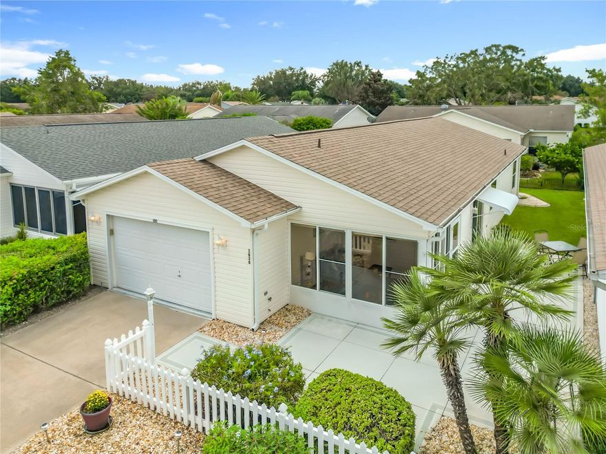 Welcome to your perfect Florida Retreat!  This well maintained 2 Bedroom 2 Bath  Colony Patio Villa offers Comfort, Convivence and VALUE!   FRESHLY PAINTED,  Roof 2020, New Water Heater 2025,  Enclosed Lanai, 2 Solar Tubes, GAS RANGE, New Washer & Dryer, NO CARPET, PARTIALY FURNISHED, Attic Stairs, Beautiful painted Garage Floor and patio, extra parking lot across from home for guests!   All that and THE BOND IS PAID!  PLUS  get around town with a  Beautiful 2015 YAMAHA GAS GOLF CART INCLUDED with accepted contract!  This very well maintained home is located just a short golf cart ride to Spanish Springs and  Lake Sumter Town Squares where  you will be close to shopping, dining, pools & golf courses! Start you mornings with a cup of coffee in the sunny ENCLOSED Lanai, your own peaceful spot to relax or unwind at the end of the day.  Large Outdoor Patio gives you plenty of room for Grilling and outdoor entrainment.   Don't miss this opportunity to have your own Villages Florida get a way or winter snow bird rental property.  Call for a private showing today!