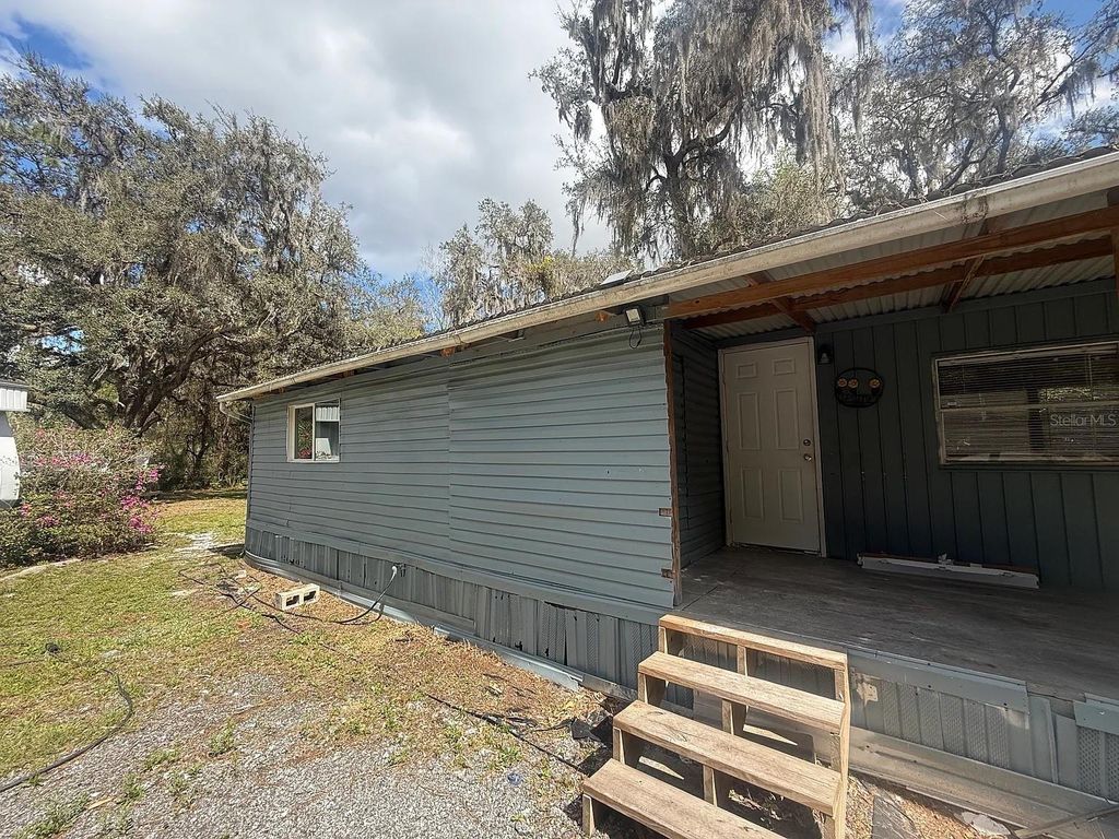Photo of 16425 Sunflower Trl, Orlando, FL 32828 (MLS # O6404960)