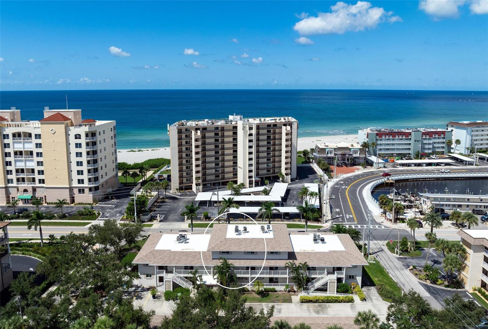 Just steps from the sand, this 2-bedroom, 2.5-bath condo blends coastal charm with a true walkable lifestyle. Less than 500 feet from the Gulf of Mexico, you can start your day with yoga on the beach, then ride your bike into Historic Downtown Venice to browse the farmers market or enjoy boutique shopping and sidewalk cafés. Freedom Boat Club, the Venice Yacht Club, the Venice Jetty, and the Crow's Nest Restaurant are also an easy waterfront stroll away—putting some of the best of Venice right at your doorstep.
Inside, the open kitchen features wood cabinetry, stainless steel appliances, and granite counters, seamlessly flowing into a spacious, sunlit great room with a wall of sliders leading to the main balcony. Both bedrooms are designed for privacy and comfort with California closets and ensuite baths, while the primary suite boasts its own private balcony for soaking in Gulf breezes morning and night. The recently renovated primary bath offers a brand-new walk-in shower and all-new fixtures and finishes.
With impact-resistant windows and sliders throughout, you’ll have peace of mind along with low-maintenance living. Even better, the association is completing a series of exterior upgrades—including new staircases, gutters, carport roofs, fresh exterior paint, and landscape renovations—with all costs covered by the seller.
This is a highly desirable property in excellent condition that is rarely available, offering the perfect opportunity to enjoy a coastal lifestyle where the beach, dining, shopping, and recreation are just a walk or bike ride away.