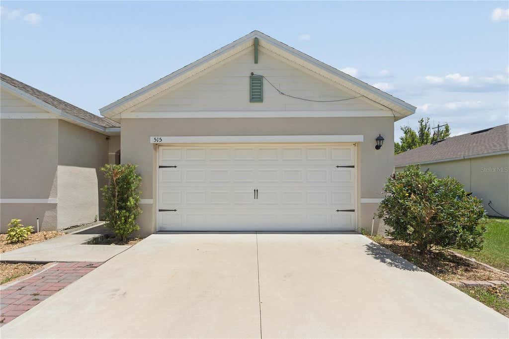 Photo of 515 Auburn Grove Terrace, Auburndale, FL 33823 (MLS # W7887166)