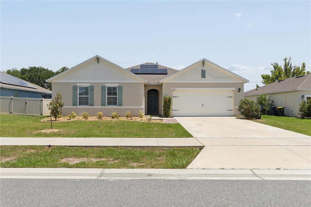 Photo of 515 Auburn Grove Terrace, Auburndale, FL 33823 (MLS # W7887166)