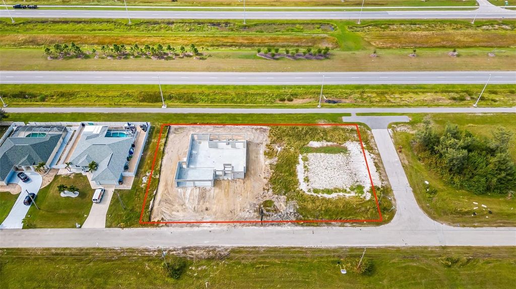 Photo of 324 NW 31st Place, Cape Coral, FL 33993 (MLS # C7520228)