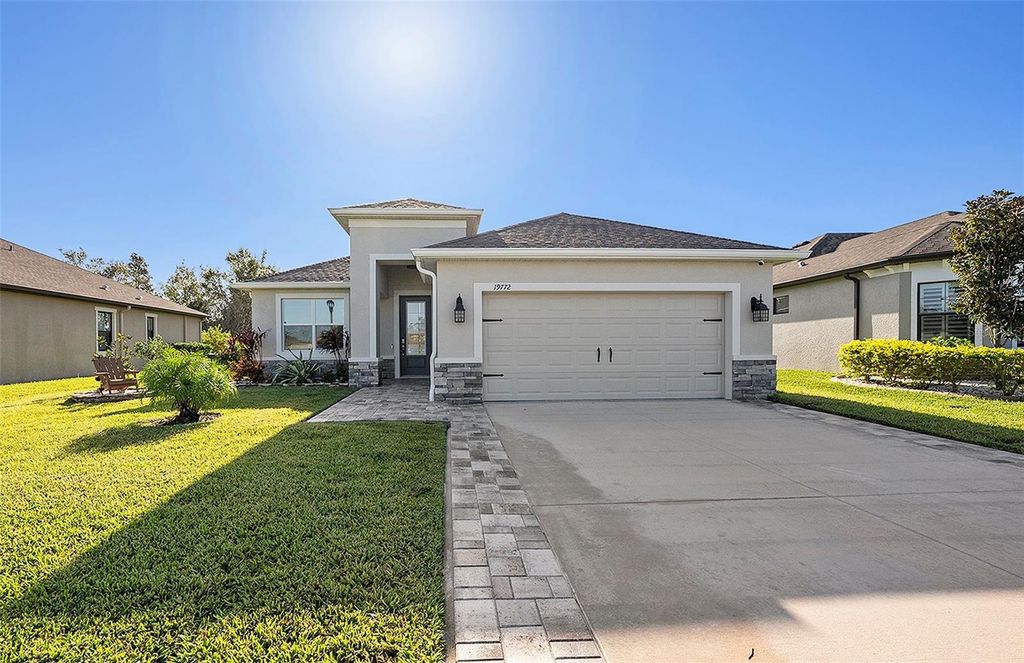 Photo of 19772 Preservation Woods Drive, Lutz, FL 33548 (MLS # TB8459797)