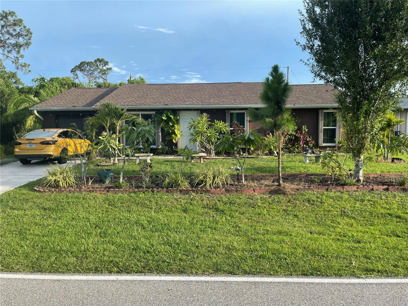 Motivated Seller!!! Charming 3-Bedroom, 2-Bathroom Home with a Newer Roof and Water Heater - Prime Port Charlotte Location! Located in a non deed restricted neighborhood near Port Charlotte High School. This 3-bedroom, 2-bathroom home with a one car garage offers a fantastic opportunity for home owners and investers alike! While the interior could use some updating, the home boasts a newer roof and water heater, giving you peace of mind on major expenses.Step inside to discover a spacious layout with plenty of potential to make it your own. The living and dining areas flow seamlessly together. The primary suite featuresan en-suite bath, while the two additional bedrooms are well sized with plenty of natural light. Enjoy Florid living with a large backyard, perfect for outdoor entertaining, gardening, as well as plenty of room. to add a pool. Conveniently located close to shopping, dining,parks, and top rated schools. This home is an excellent opportunity to add value with your personal touch!