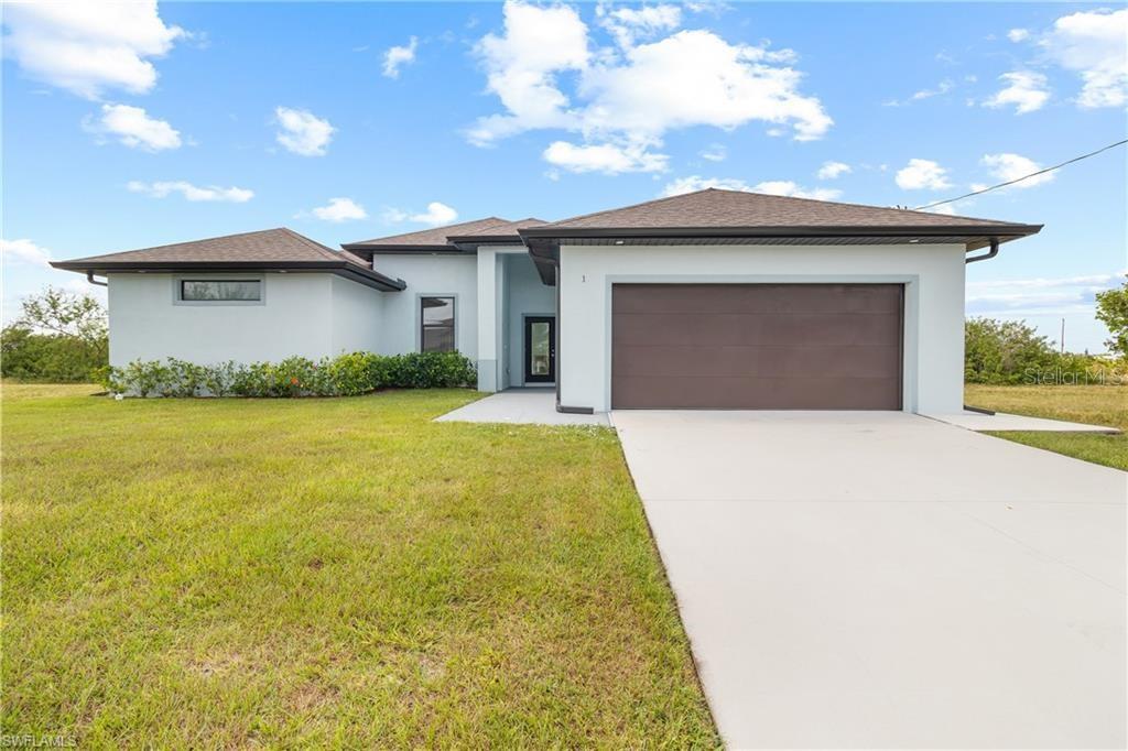 Now It’s the Perfect Time to Buy! This gorgeous new construction on a freshwater canal could be the one! With an open concept floor plan and a sleek modern design, this home has everything you need and more. Here’s what makes it stand out: 3 spacious bedrooms + Den 2 stylish baths 2-car garage Gorgeous Italian tile throughout the home A kitchen that’s chef-approved with quartz countertops, stainless steel appliances, and a French door refrigerator Remote control ceiling fans in every room for your comfort The master suite is a dream! It features his & hers custom-designed closets, a self-standing tub, and a double-entry walk-in shower with multiple showerheads and separate sinks. Plus, the under-truss lanai offers a spacious area for entertaining, and the home is built with hurricane impact windows and doors for peace of mind. It also includes a concrete driveway and auto-sprinkler system—low maintenance, high comfort. And the best part? This home is in a NO FLOOD ZONE! Scheduled a tour 24 hours in advance and see this stunning home for yourself. It’s ready to welcome you!