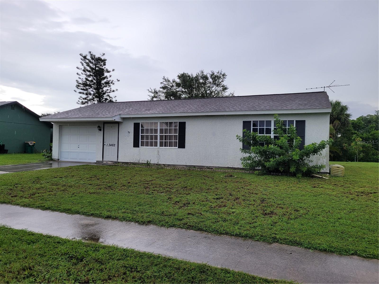 Opportunity Knocks! - 2 bedroom, 2 bath, 1 car garage home located in the very much sought-after Gardens of Gulf Cove with all of its' amenities, including 2 pools, tennis courts, fitness equipment, clubhouse and more. Enjoy the convenience of sidewalks and underground utilities. This home lies along a peaceful freshwater canal, perfect for relaxing in your own back yard and enjoying the nature surrounding you. A newer roof installed in 2023, and tile throughout. Both bathrooms feature tub/shower combinations. While this home needs some TLC. Consider it your blank canvas. It is the perfect opportunity to make it your own. Furniture included. Beaches, boating, golfing, shopping and dining - all nearby.