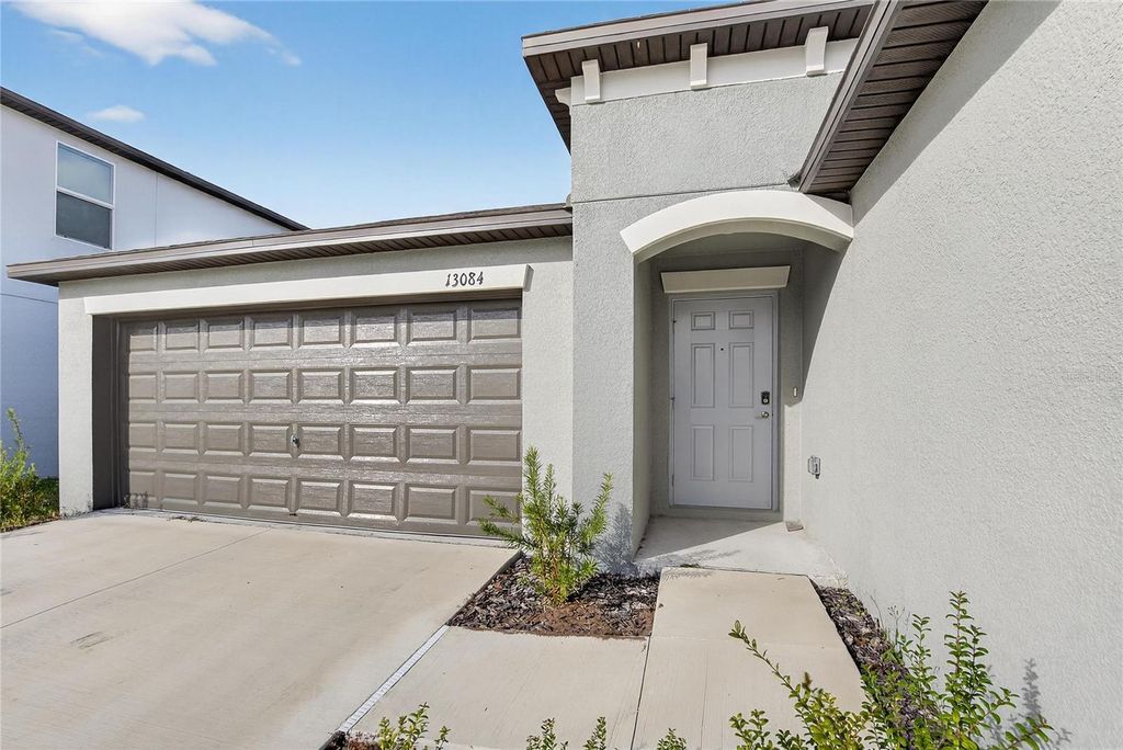 Photo of 13084 Garnet Raspberry Ave, Wimauma, FL 33598 (MLS # TB8450940)