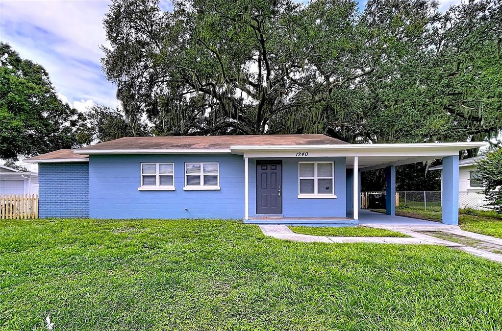 Photo of 1240 Woodland Avenue, Lakeland, FL 33801 (MLS # TB8436786)