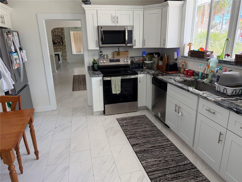 Photo of 850 Mandalay Avenue, Clearwater Beach, FL 33767 (MLS # TB8489421)