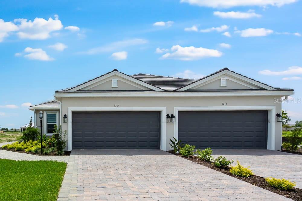 Under Construction. New Construction - Ready Now! Built by America's Most Trusted Homebuilder. Welcome to the Ibis at 3204 Torta Court in resort-style living at Esplanade at Azario Lakewood Ranch, the perfect blend of relaxation and recreation! Enjoy the heated resort-style pool, state-of-the-art fitness center, and energizing aerobics classes. For outdoor enthusiasts, there are pickleball courts, scenic trails, Vitality Park, and if golf is your game, you'll love Esplanade's 18-hole championship course! Unwind with a facial massage or by the fire pit after a workout. Exclusive amenities like a Wellness Center, Culinary Center, and sports courts ensure there's something for everyone, whether you want to stay active or relax in style. This stylish Twin Villa designed for comfort and ease. The elegant primary suite features a walk-in closet, dual vanities, large shower, and private commode. A secondary bedroom, bath, and study at the front of the home offer privacy for guests. At the center, enjoy an open gathering room, designer kitchen, and dining area, all leading to a screened lanai with backyard views — perfect for relaxing or entertaining. Experience low-maintenance living in a vibrant, resort-style community. Additional Highlights Include: Study with pocket doors in place of flex. extended screened patio, 8' interior doors, and tray ceilings at primary suite, study, gathering and dining rooms. Photos are for representative purposes only. MLS#A4654114