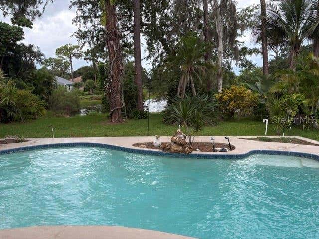 Photo of 8338 Shadow Pine Way, Sarasota, FL 34238 (MLS # A4701093)