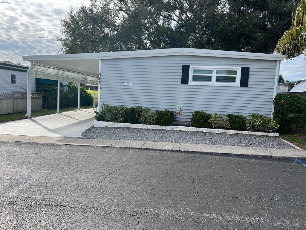 Photo of 41 Thatch Palm Street E #41, Largo, FL 33770 (MLS # TB8453108)