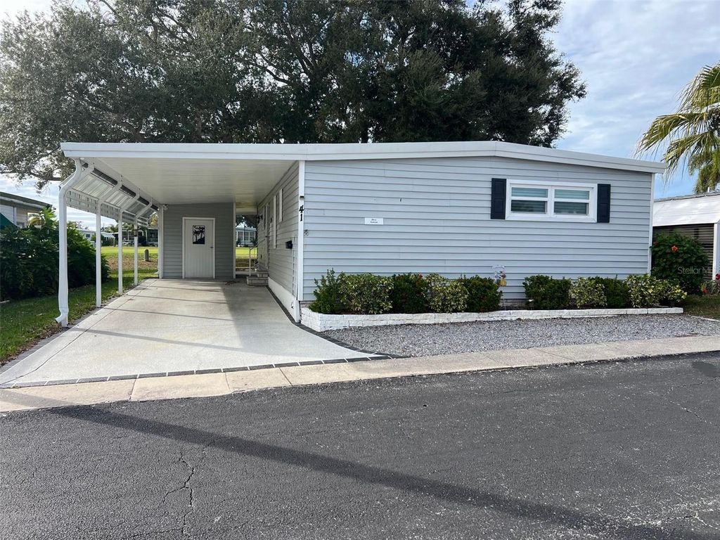 Photo of 41 Thatch Palm Street E #41, Largo, FL 33770 (MLS # TB8453108)