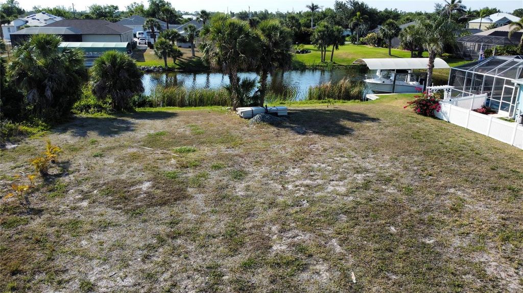 Photo of 9740 Singer Circle, Port Charlotte, FL 33981 (MLS # C7509068)