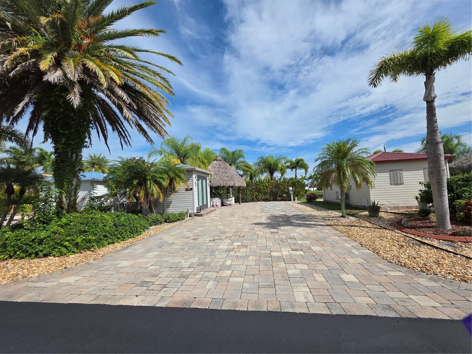 MOTIVATED SELLER! Silver Palms RV 5 Star Resort - Beautiful vacant lot with a Casita and a Tiki Hut. Wholly shed insulated and wired. Patio furniture staying, inside Casita is a Washer and dryer, with mini split, storage cabinet. Privacy area for sitting on the pond and enjoying the water and sunsets. Tiki comes with fan and lights. Stunning lot.