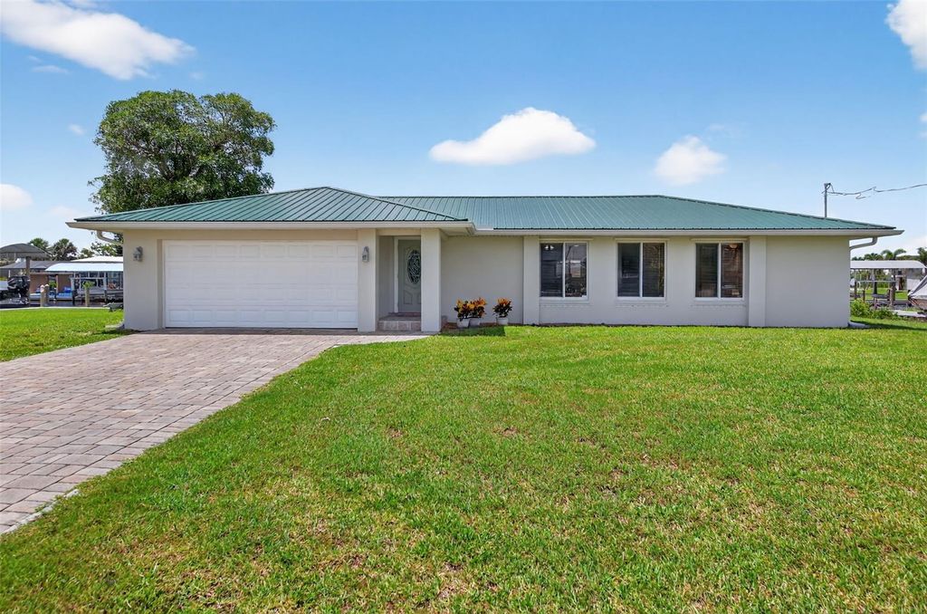 Photo of 24277 Treasure Island Boulevard, Punta Gorda, FL 33955 (MLS # O6315484)