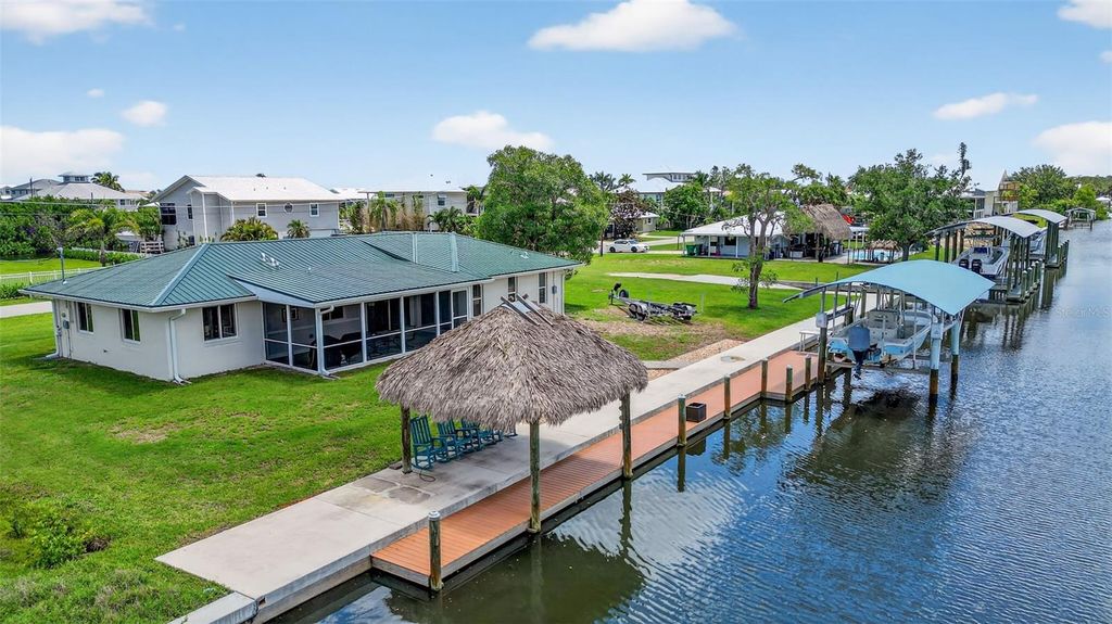 Photo of 24277 Treasure Island Boulevard, Punta Gorda, FL 33955 (MLS # O6315484)