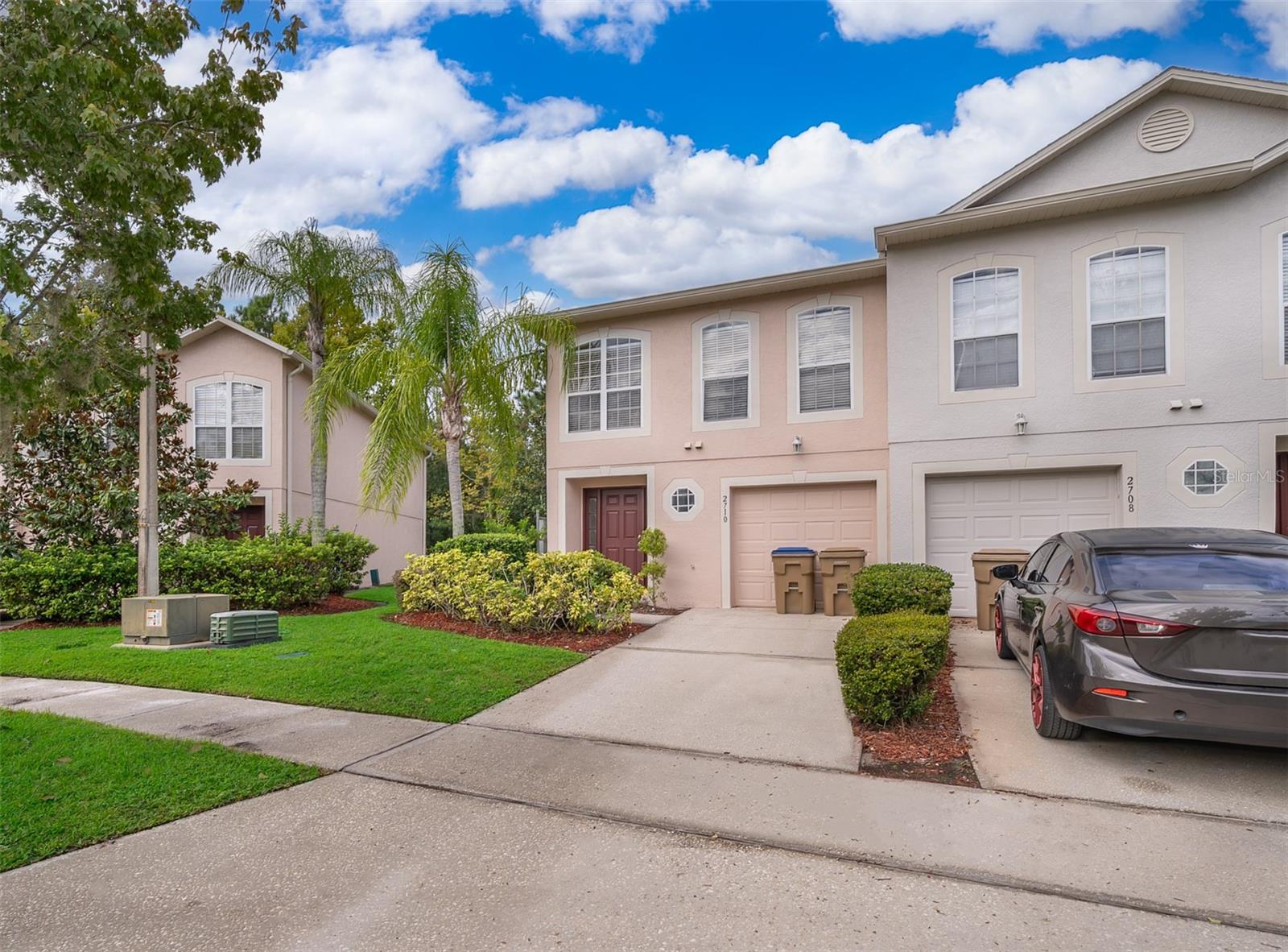 Beautiful three-bedroom corner unit townhouse with loft and two and a half baths in the sought-after Eagle Bay community. The spacious living room flows into the kitchen and dining area, perfect for entertaining. The kitchen features stainless steel appliances, a breakfast bar, and pantry. Sliding doors open to a private patio overlooking peaceful conservation with no rear neighbors. Upstairs offers all bedrooms, including a master suite with walk-in closet. Eagle Bay amenities include a pool, playground, basketball and volleyball courts. Prime location near the Turnpike, shopping, dining, golf, and entertainment. Just 15 minutes to Lake Nona and Boi Park for outdoor activities and family fun.
