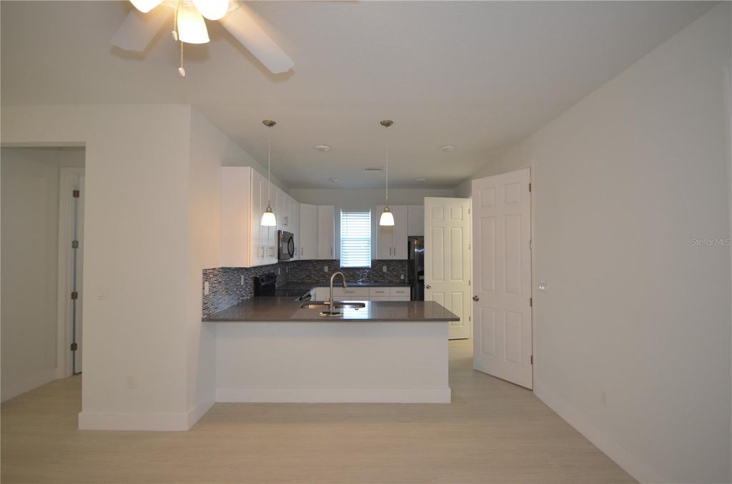 Photo of 8581 Agate Street, Port Charlotte, FL 33981 (MLS # O6352079)