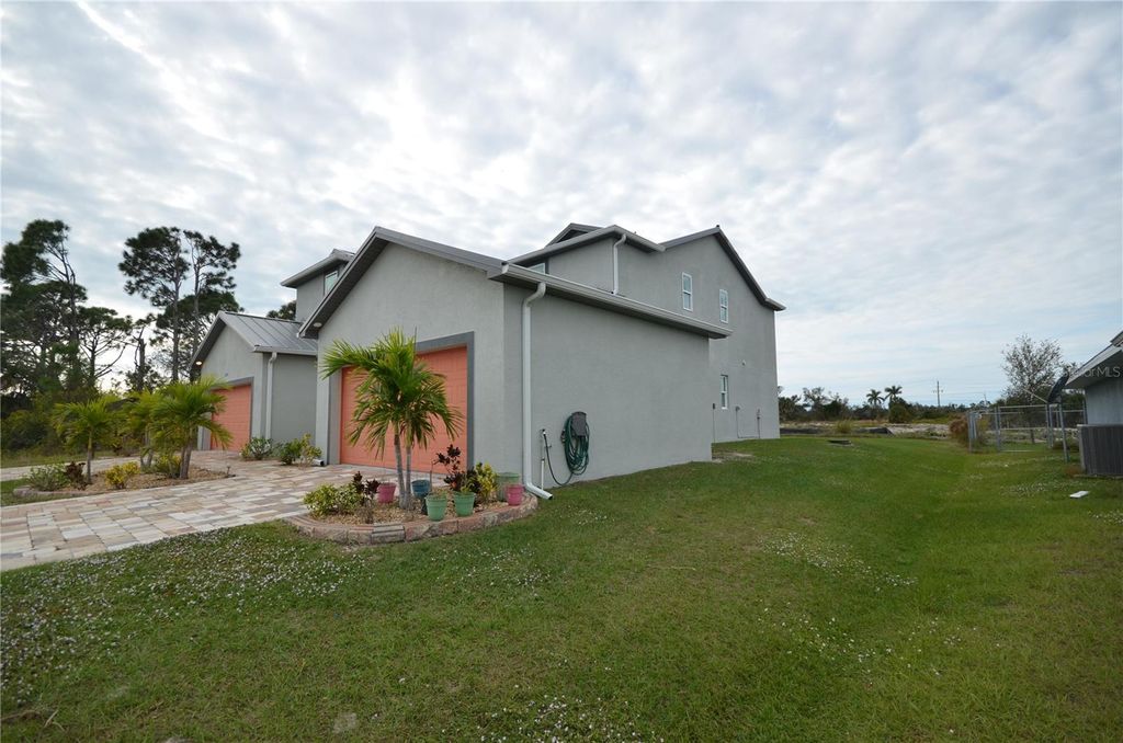 Photo of 8581 Agate Street, Port Charlotte, FL 33981 (MLS # O6352079)
