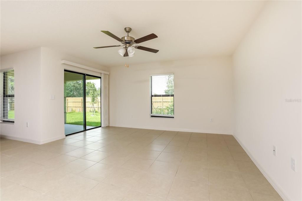 Photo of 35685 Rose Moss Avenue, Leesburg, FL 34788 (MLS # O6355732)