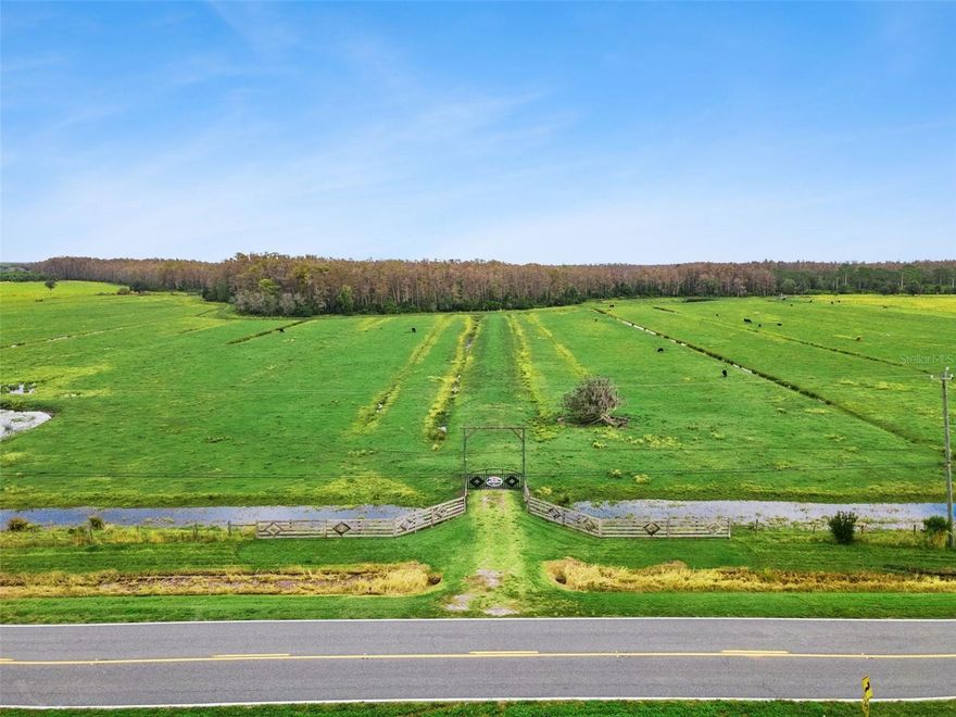 Just over 37 acres of prime rural land located on S Canoe Creek Road in Kenansville. Zoned RC, this expansive parcel offers excellent frontage and a south-facing exposure, making it ideal for agricultural use, cattle operations, or other permitted rural uses. The property features partial fencing, open pastureland, and electric availability nearby, with well and septic needed. No HOA and not located within a development, providing flexibility and privacy. Convenient access via a publicly maintained paved road, yet still offering the peace and space of true country living. Buyer to verify zoning, land use, and any intended use with Osceola County through their own due diligence.