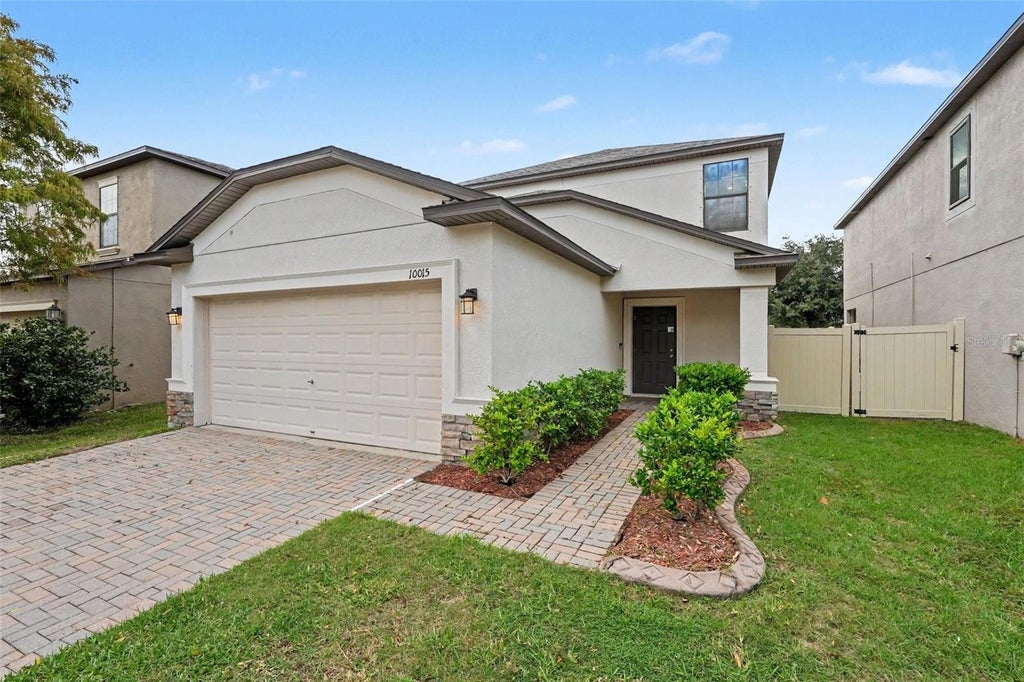 Photo of 10015 Newminster Loop, Ruskin, FL 33573 (MLS # O6452707)