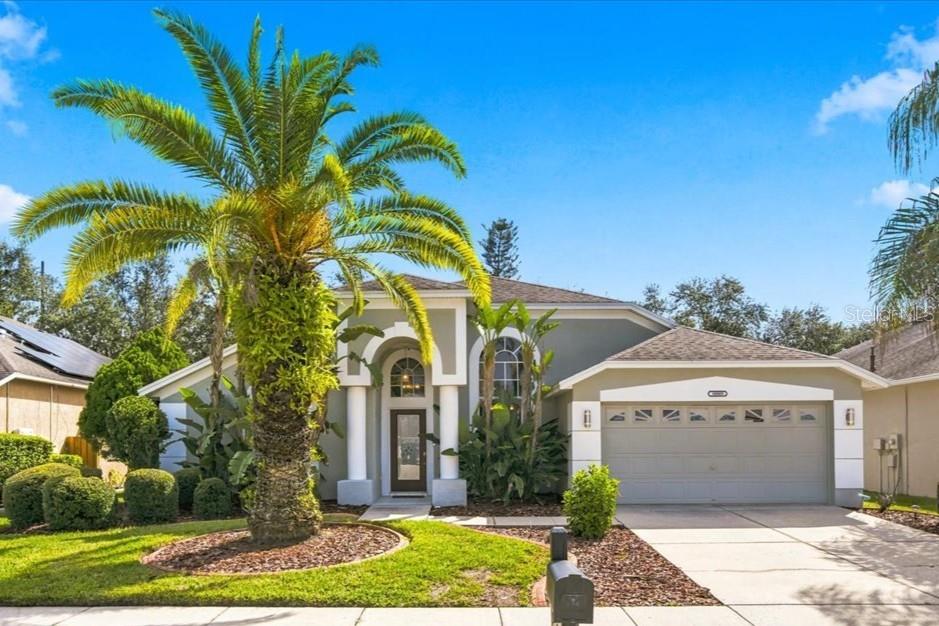 Photo of 18009 Palm Breeze Drive, Tampa, FL 33647 (MLS # W7890112)