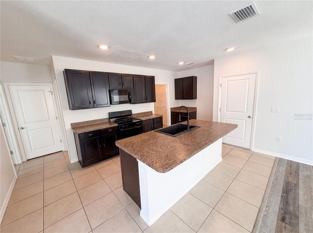 Photo of 10225 Mangrove Well Road, Sun City Center, FL 33573 (MLS # O6399096)