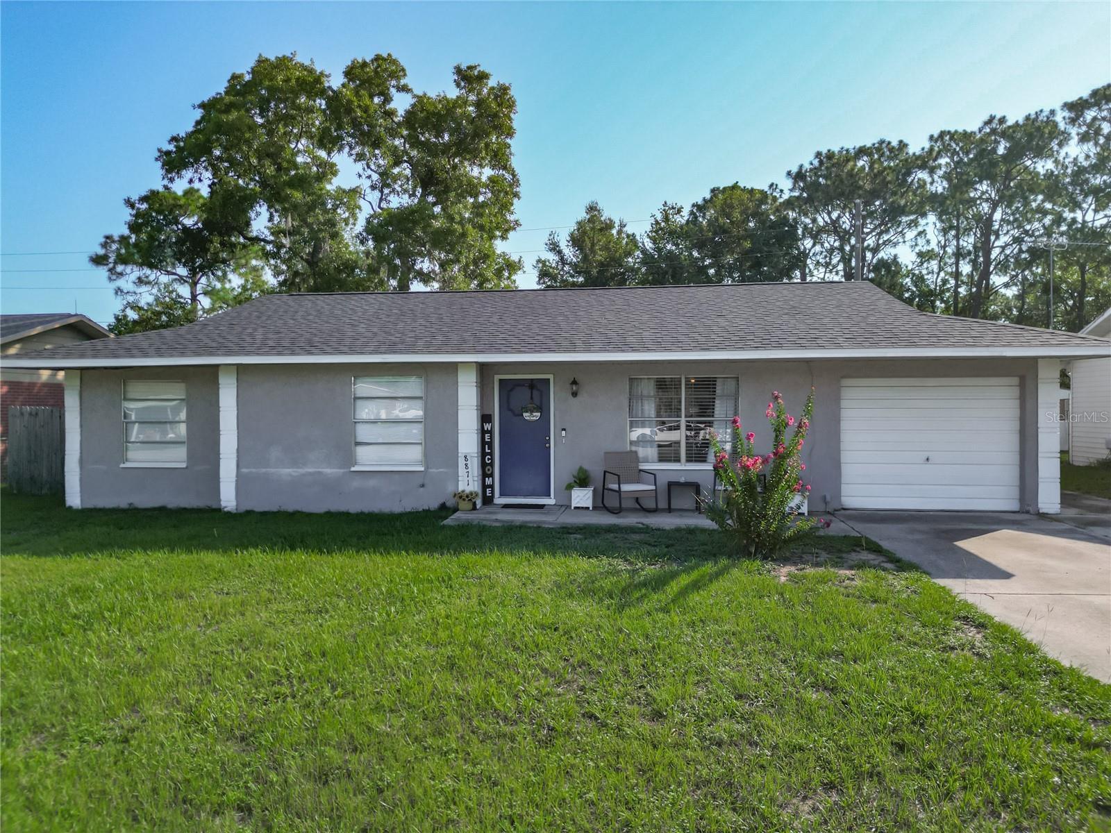 Welcome home to this well-maintained 3-bedroom, 2-bathroom home offering comfort, convenience, and peace of mind with a new roof installed in November 2023. This home is ideally located near grocery stores, medical offices, and banking, making day-to-day errands a breeze. Inside, you'll find a functional layout perfect for anyone. Step out back to enjoy a spacious enclosed porch—great for morning coffee, relaxing evenings, or entertaining guests—overlooking a fully fenced backyard that’s perfect for pets or play. Whether you're a first-time homebuyer, downsizing, or investing, this home offers the ideal combination of location and livability in the heart of SE Ocala.