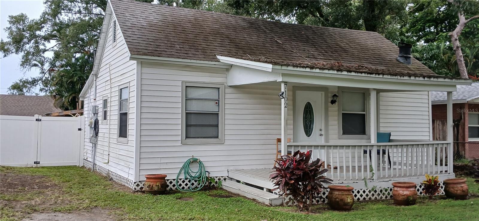 Are you looking for a place to call your own? Welcome to this 2bed/1bath cottage ready for a 1st time homebuyer or if you are looking to downsize. As you walk up you will immediately feel invited by the spacious open front porch where you will spend many days or nights relaxing from the calmness that surrounds you. As you enter you are greeted by a large living room that features a wood burning fireplace then over to the Eat in Kitchen that opens to the laundry room and then out to an open patio with a view of the spacious backyard. No Carpet!! Imagine growing all your own fruits and vegetables not to mention there is even room for a pool. You will also be close to an abundance of stores and restaurants. X Flood Zone. Great location!!!