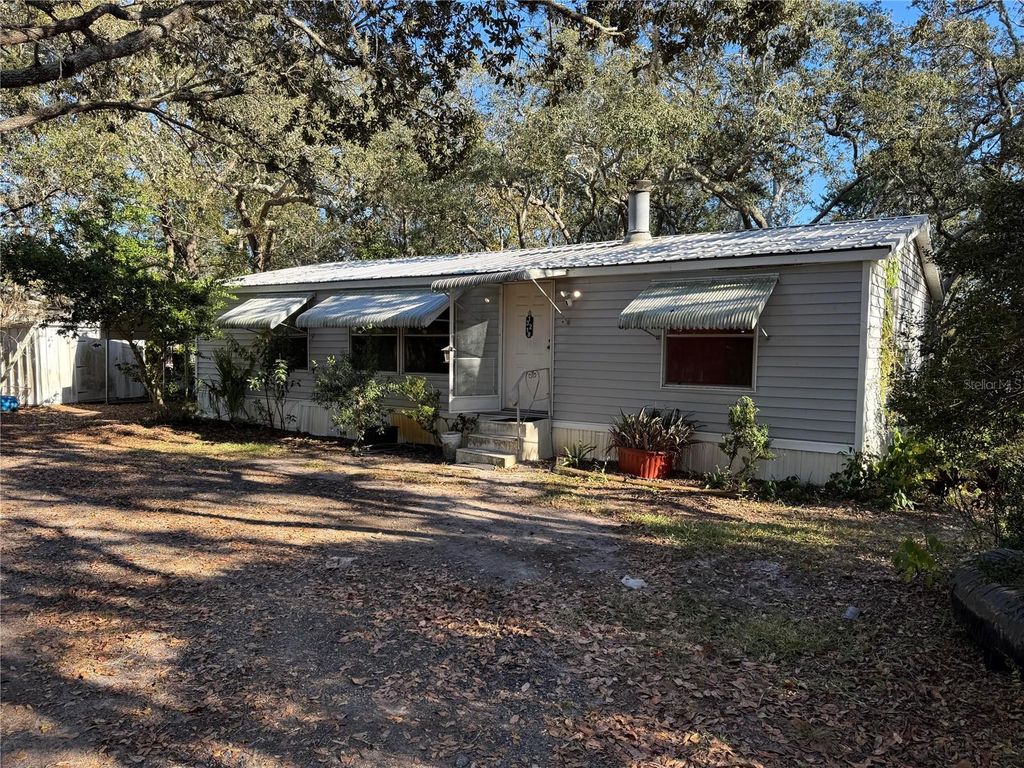 Photo of 13218 Vivian Lane, Hudson, FL 34669 (MLS # O6364711)