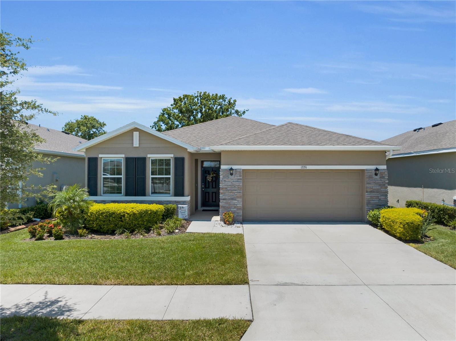 Discover this basically new 4-bedroom, 2-bath residence where modern comfort meets refined living and energy efficiency takes center stage with FULLY PAID SOLAR at closing, delivering immediate and lasting savings. Thoughtfully designed for both daily living and entertaining, the home boasts a spacious open split floor plan anchored by a gourmet kitchen featuring striking granite countertops, stainless steel appliances, and an oversized walk-in pantry with custom built-in shelving. The luxurious primary suite serves as a private sanctuary with dual walk-in closets and a spa-inspired bathroom complete with an upgraded granite vanity, soaking tub, and separate glass-enclosed shower. Enjoy peaceful moments on the fully screened lanai, overlooking a private conservation view with no rear neighbors offering a serene backdrop that enhances the home’s tranquility.
Additional highlights include a full-house gutter system, irrigation, and an HOA that covers lawn care, internet, and cable, making maintenance effortless. This move-in ready home is your chance to live in one of the area’s most sought-after communities.